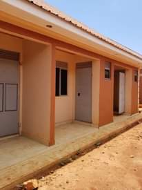 A picture of 7double rooms for sale at nansana kabulengwa seated on 60by