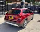 A picture of Price....26mil Call 0658056651 2012 BMW X1 109968 km Sunroof leather