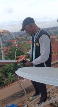 A picture of CCTV satellite and electric fence installations
