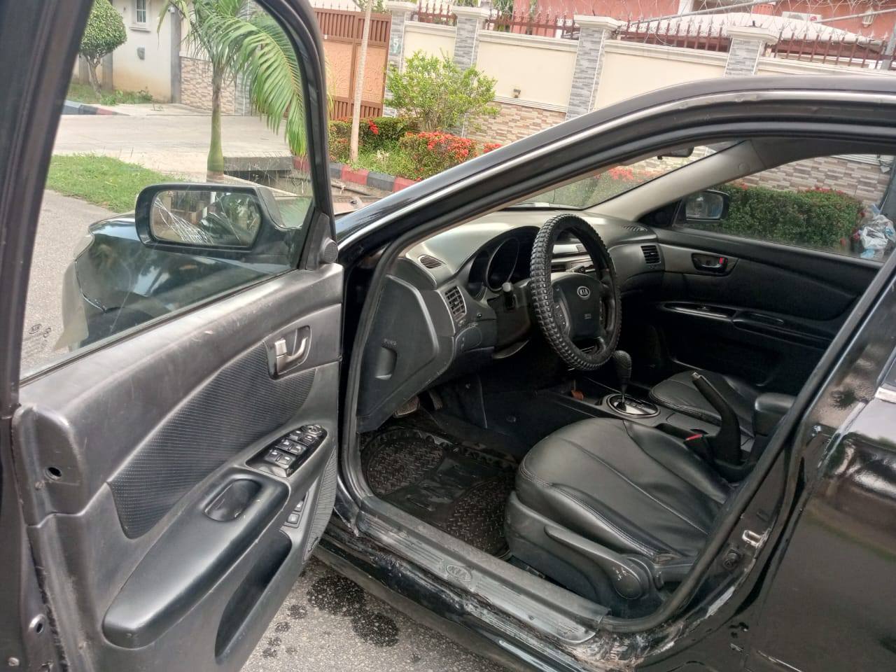A picture of  Super distress 2010 Kia optima with sound engine automatic