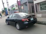 A picture of 5 months used 2011 Toyota corolla car is Sharp with