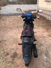 A picture of TVS NEO very neat and everything working perfectly engine has
