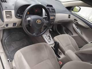 A picture of Toyota corolla 2012 model very clean in and out nothing