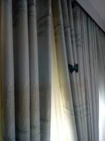 A picture of Curtains and rods
