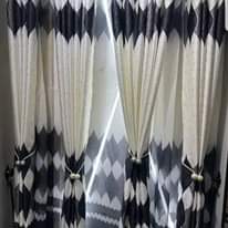 A picture of Curtains and rods