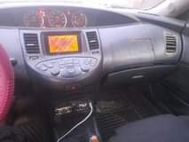 A picture of Nissan premera 2005 manual going for 750k Lagos Engine is
