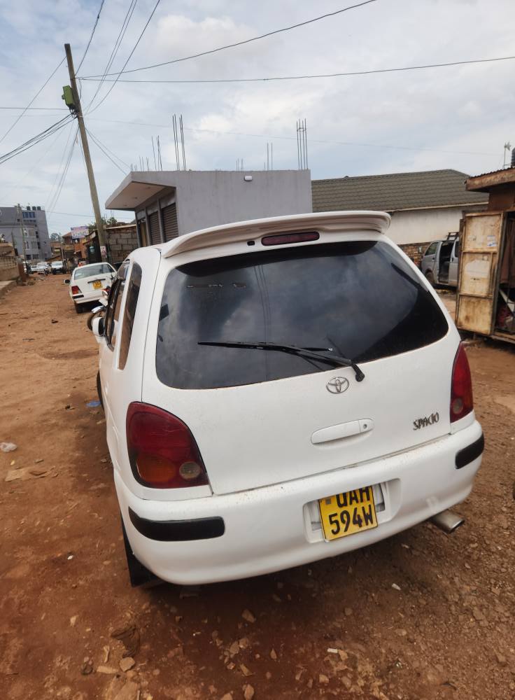 A picture of A White Toyota Corolla Spacio