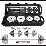 A picture of 50 KG chrome barbell and dumbbell set Price 600 000