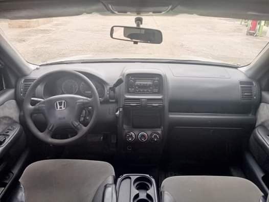 A picture of Honda CRV 2004 model . 4 plugs... Everything working perfectly