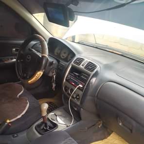 A picture of 2003 manual gear Mazda Sound engine and gear Chilling AC
