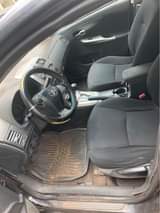 A picture of Distress Toyota Corolla 2012 model ac need attention body need