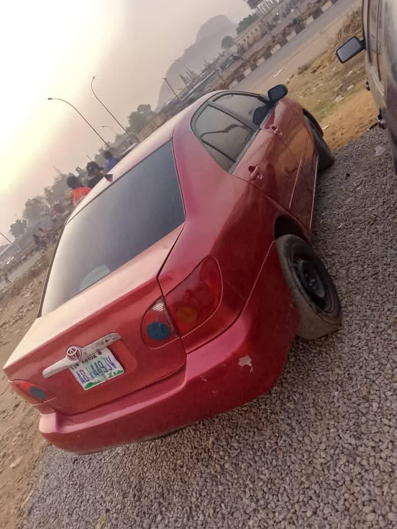 A picture of Sharp 2004 Corolla engine and gear perfect AC needs attention
