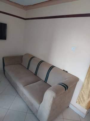 A picture of L Shape nit couch and smooth 650k