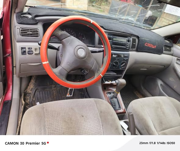 A picture of 06 corolla Only body needed attention ac gear engin ok