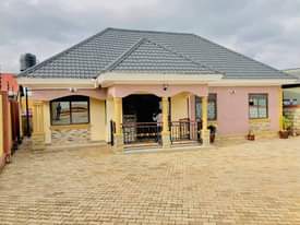 A picture of House for sale at 300m. Nansana Naluvule. With title Whatsapp.