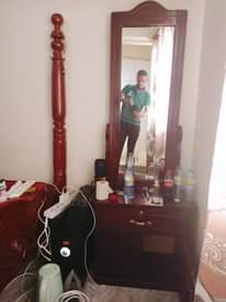 A picture of Bed and mattress 5by6 wardrobe and dressing mirror 750k