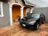 A picture of Toyota Camry 2004 4plugs painted on first body Engine gear