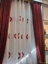 A picture of Curtains and rode 