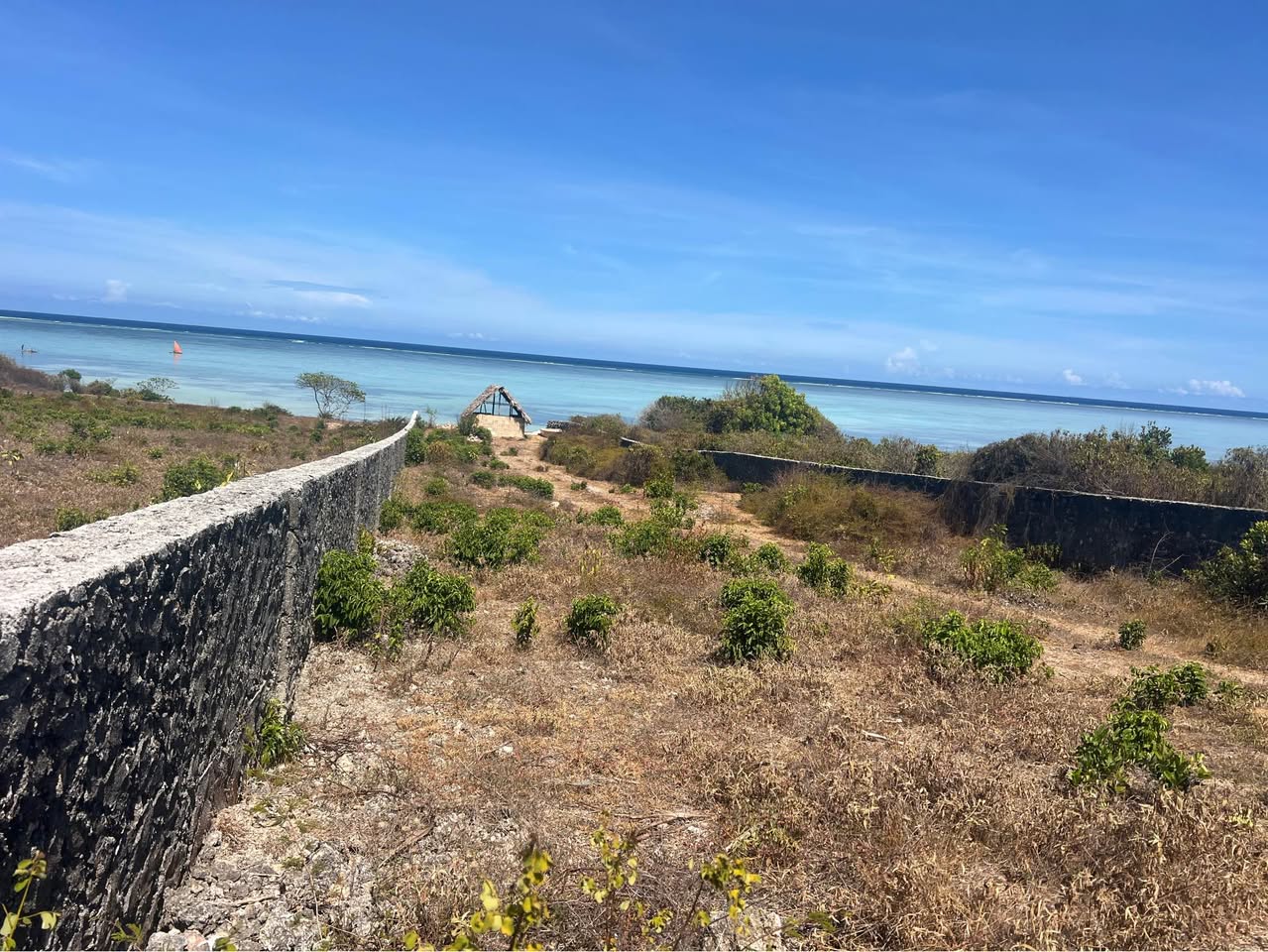A picture of A beachfront plot on the cliff is available for sale