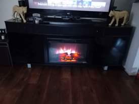 A picture of 60 tv fire place electric with Bluetooth sound bar