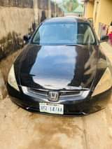 A picture of Honda Accord E O D nd Toyota Corolla is available