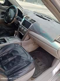 A picture of Camry 2008 engine ac gear has been converted and also