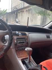 A picture of Toyota Avalon dashboard Engine Gear Ac chilling perfect Interior very