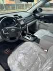 A picture of 2014 Toyota Camry Straight body neat interior Sound engine and