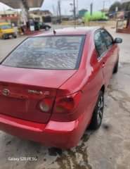 A picture of Toyota Corolla 2004 Engine tapping little Gear and AC ok