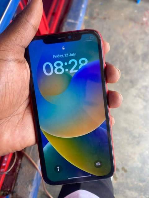 A picture of iPhone 11 red 64gb