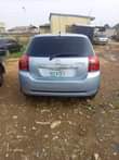 A picture of Toyota corolla Obama Naija