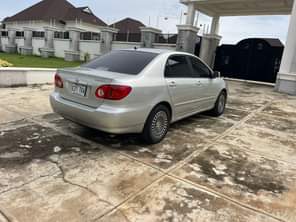 A picture of LIGHTLY USED TOYOTA COROLLA LE 2003 MODEL WITH DUTY LOCATION