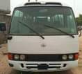 A picture of Naija used Toyota Coaster Bus buy and fix the AC