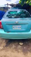 A picture of Chevrolet optra 2006 model for sale. Interested buyer should DM.