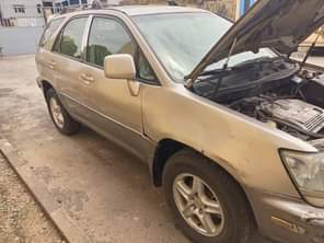 A picture of Lexus RX 300 2000 model Buy and drive Body needs
