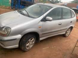 A picture of Clean Nigerian Used Nissan Almera Tino first body Fabric interior