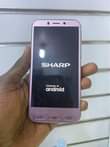 A picture of Sharp 32gb working very well 120k only 0759979422 0773648989