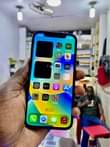 A picture of iPhone 12 64gb 1 45M Faceid working DM WhatsApp or