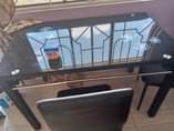 A picture of NAUZA DINNING TABLE YA KIOO VITI V 4 NA MEZA