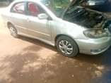 A picture of Toyota Corolla 2003 engine smoking