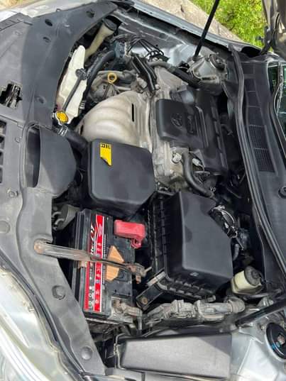 A picture of 2015 Registered Toyota Camry flash on the fire body Tukumbo