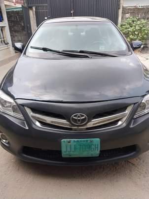 A picture of Distress sale Black Toyota Corolla fingers 3 350m location irebe