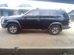 A picture of NISSAN PATHFINDER JEEP WITH AUXILIARY GEAR. VERY GOOD ENGINE AND