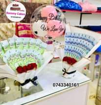 A picture of  flowerbouquet moneyhampers balloons cakes surprisepackages gifts deliveryavailable kampalaUg