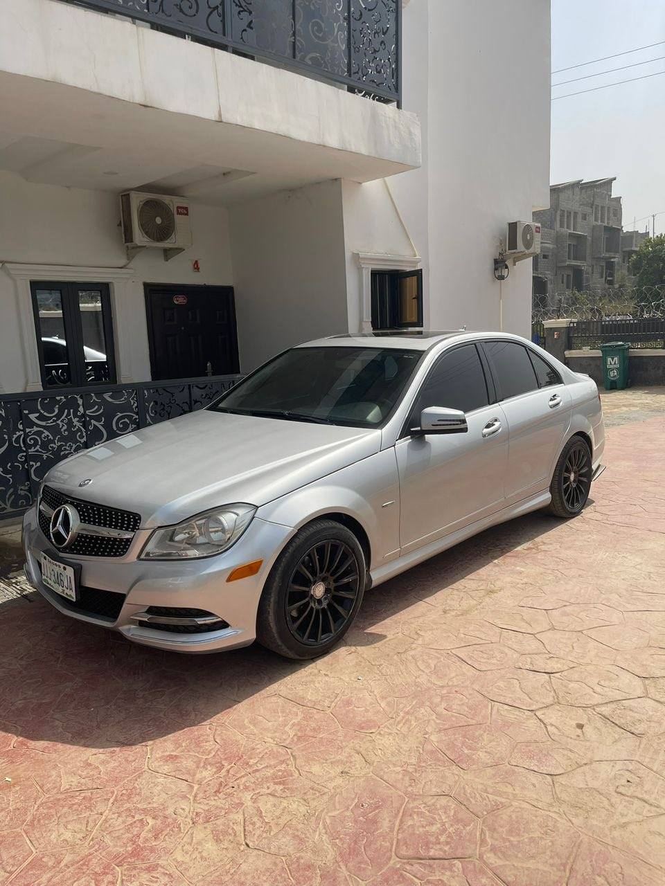 A picture of 2012 Mercedes Benz C250 super clean AC chilling everything intact.