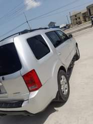 A picture of Honda pilot 2010 Engine Gear and AC is Good condition