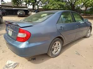A picture of NEATLY USED 2004 MODEL TOYOTA CAMRY BIG DADDY Absolutely nothing