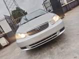 A picture of 2004 Toyota Corolla LE Super clean perfect Engine and gear