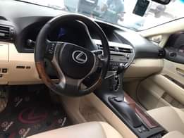 A picture of Reg 2013 Lexus Rx350 Burgundy on Cream interiors Car is