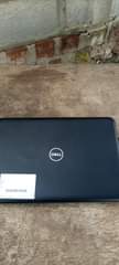 A picture of Dell latitude Celeron R N 4100 portable laptop at 450